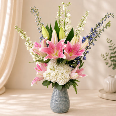 Elegant Floral Arrangement In Decorative Vase