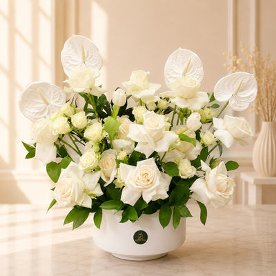 Fresh Flower Arrangement In White Ceramic Vase