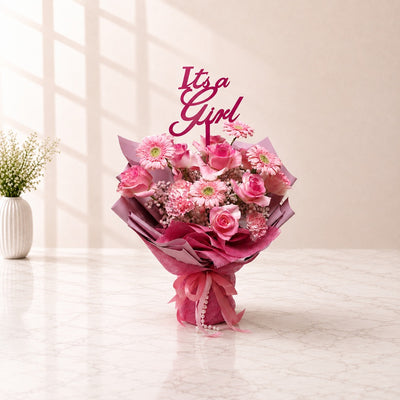 Welcome Baby Girl Pink Rose & Gerbera Flower Bouquet with “It’s a Girl” Topper
