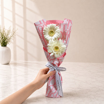 Elegant White Gerbera Flower Bouquet with Pink Printed Wrapping