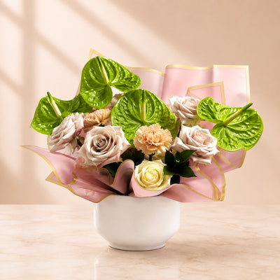 Fresh Green Anthurium & Pastel Rose Arrangement in White Vase