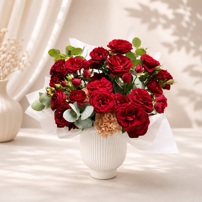Elegant Red Rose Arrangement in White Ceramic Vase