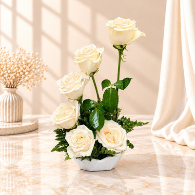 Elegant White Rose Flower Arrangement In White Vase