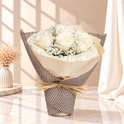 Elegant White Rose Bouquet With Natural Textured Wrapping