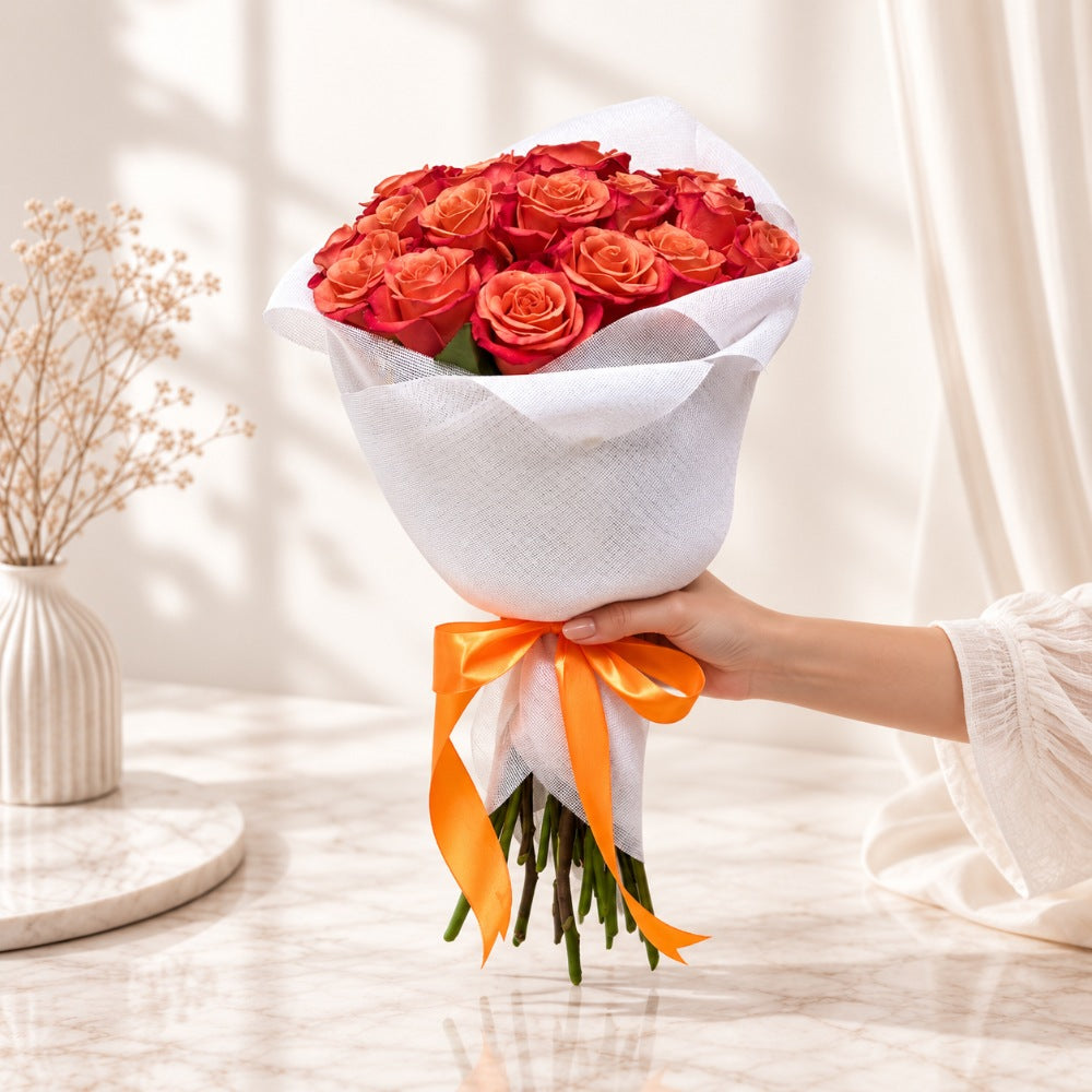 Classic Orange Rose Hand Bouquet in Elegant White Wrap